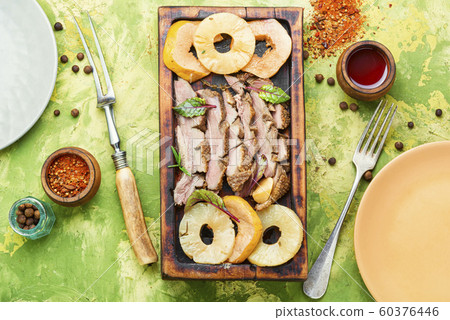 Roasted duck with pineapple 60376446