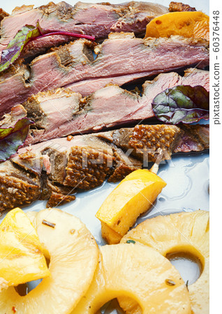 Roasted duck with ananas 60376448
