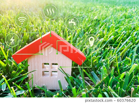 Miniature home and symbols of public utilities. Choosing a house to buy, assessing the cost and condition of the building. Location in the city. Repair and renovation, maintenance services. 60376620