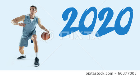 Young caucasian basketball player against white studio background Young caucasian basketball player against white studio background 60377003