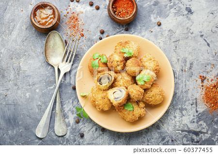 Homemade breaded mushrooms Homemade breaded mushrooms 60377455