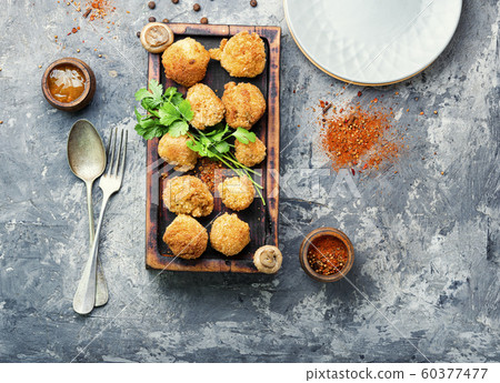 Homemade breaded mushrooms Homemade breaded mushrooms 60377477