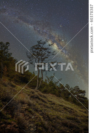 starry night sky over the mountains. 60378387