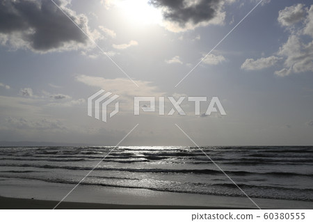 Autumn cloudy sky and sea and sunshine 60380555