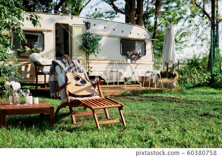 Camper camping at summer vacation Camper camping at summer vacation 60380758