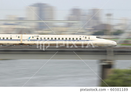Tokaido Shinkansen N700 series crossing the Tamagawa River Tokaido Shinkansen N700 series crossing the Tamagawa River 60381189