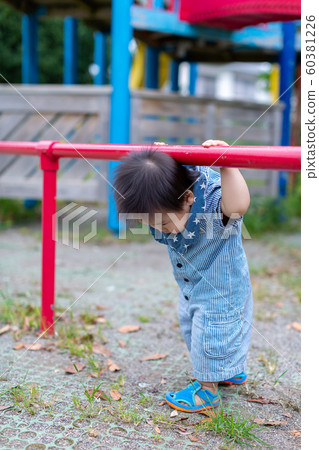 Infants playing in the park Infants playing in the park 60381226