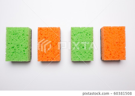 Sponge for washing dishes on a white isolated background. 60381508