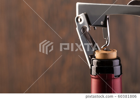 Corkscrew and bottle of wine Corkscrew and bottle of wine 60381806