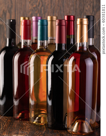 Row of vintage wine bottles Row of vintage wine bottles 60381811