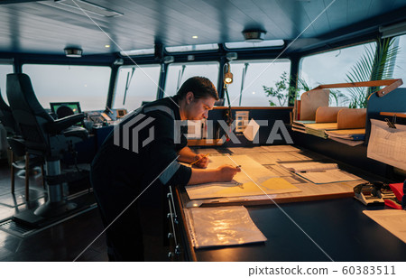 Marine navigational officer during navigational watch on Bridge 60383511