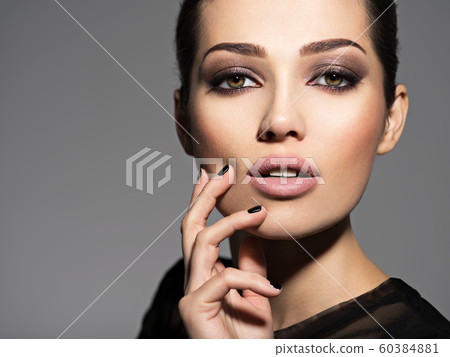 Face of a beautiful girl with fashion makeup and 60384881