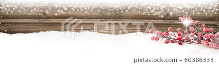 Red Bauble Branch on Wooden Background Red Bauble Branch on Wooden Background 60386333