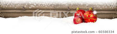 Red Bauble Branch on Wooden Background Red Bauble Branch on Wooden Background 60386334