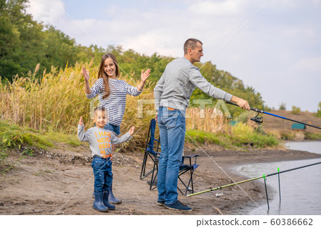 A happy family spends time together they teach 60386662
