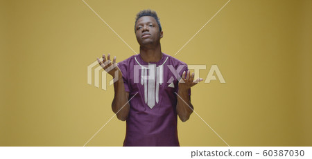 Pensive man touching chin Pensive man touching chin 60387030