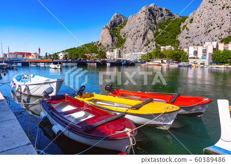Sunny town and port Omis, Croatia Sunny town and port Omis, Croatia 60389486
