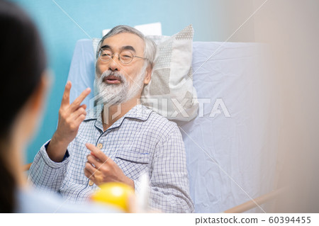 Senior man and daughter 60394455