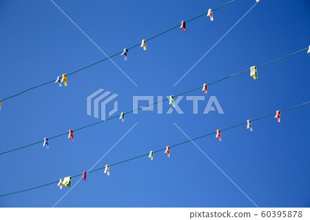 Clothesline and clothespin, sky, 60395878