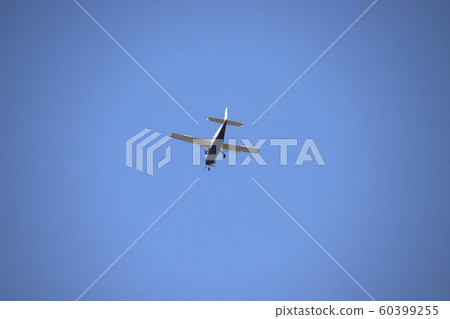 A light aircraft flying in the sky A light aircraft flying in the sky 60399255