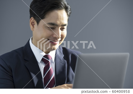 Businessman with laptop Businessman with laptop 60400958