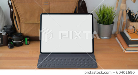 Close-up view of professional workplace with blank 60401690