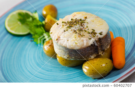 Pollock steak with vegetables 60402707