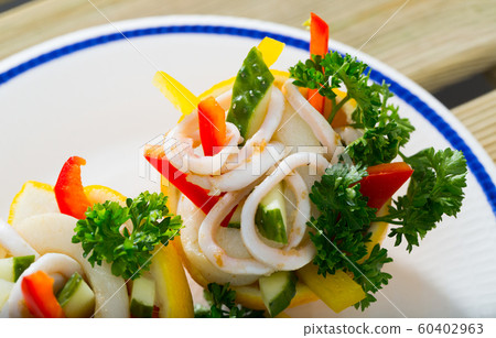 Salad with calamari and vegetables Salad with calamari and vegetables 60402963