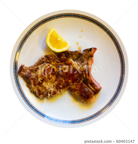 Italian dish - traditional veal chop with lemon Italian dish - traditional veal chop with lemon 60403147