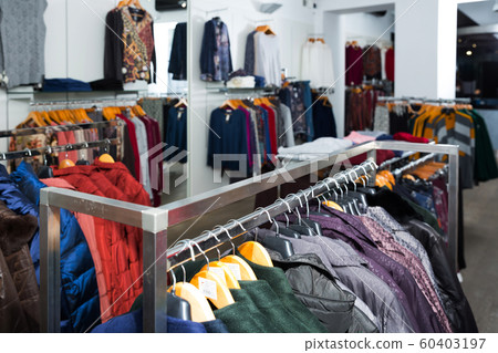 Stand with various coats Stand with various coats 60403197