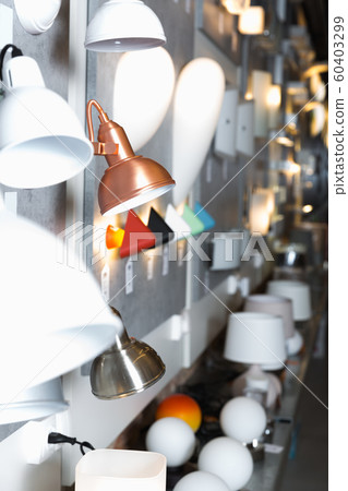 Modern desk lamp in the designer furniture shop Modern desk lamp in the designer furniture shop 60403299