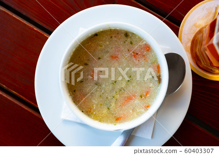 Plate with semolina and egg soup 60403307