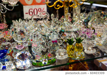 Bohemian glass figurines in showcase Bohemian glass figurines in showcase 60403309