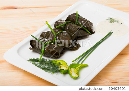 Stuffed grape leaves with assorted fillings Stuffed grape leaves with assorted fillings 60403601