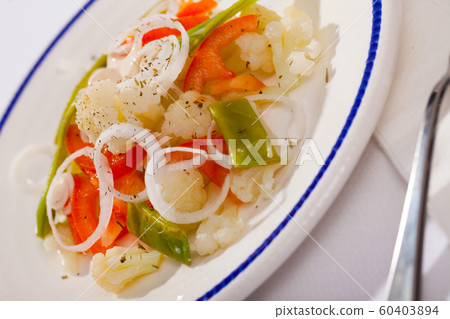 Plate of tasty salad with cauliflower 60403894