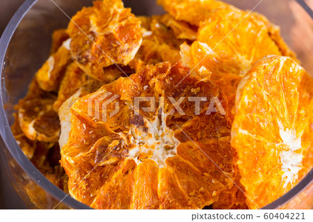 Illustration of container with dried orange Illustration of container with dried orange 60404221
