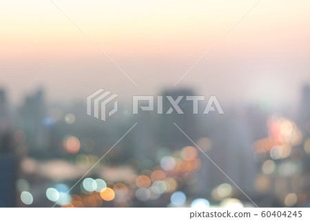 Blur city background rooftop view of cityscape business building landscape night lights bokeh Blur city background rooftop view of cityscape business building landscape night lights bokeh 60404245
