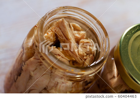 Bonito fillets in oil in glass jar Bonito fillets in oil in glass jar 60404463
