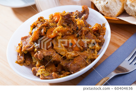Stew of cabbage with pork Stew of cabbage with pork 60404636