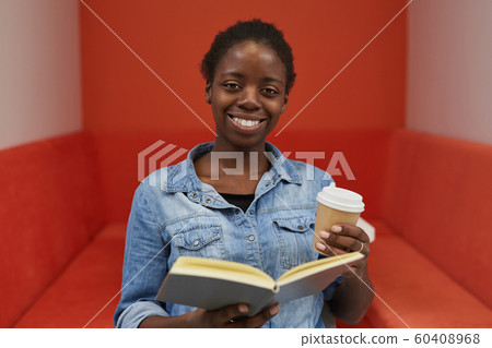 African woman with book African woman with book 60408968