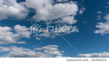 Time lapse of flying clouds nature background no 60409434