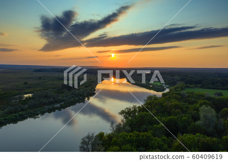 sunrise or sunset with forest and river 60409619