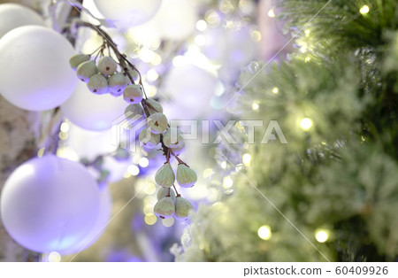 Abstract light bokeh with white christmas tree Abstract light bokeh with white christmas tree 60409926