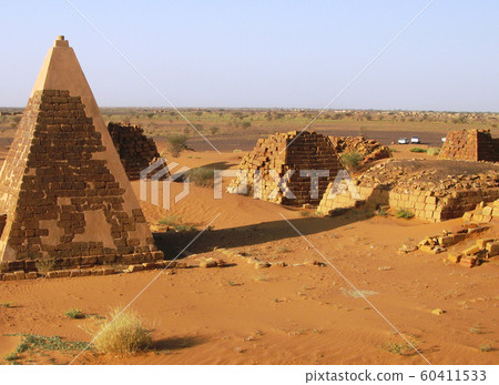 Panorama of Meroe pyramids in the desert at sunset Panorama of Meroe pyramids in the desert at sunset 60411533