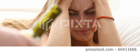 beautiful young blond woman stay in bad 60411666
