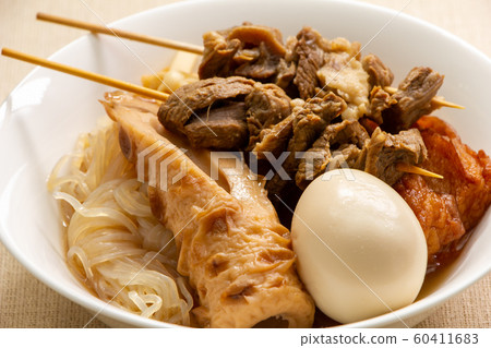 Oden. (Oden seeds are beef strip skewer, egg, chikuwa etc.) Oden. (Oden seeds are beef strip skewer, egg, chikuwa etc.) 60411683