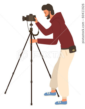 Man Shooting Videos or Photos by Camera on Tripod Man Shooting Videos or Photos by Camera on Tripod 60411926