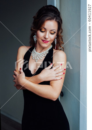 beautiful girl in black evening dress cocktail party 60411927