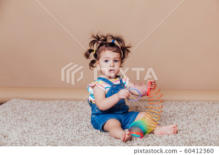 funny girl with pigtails in summer kids 60412360