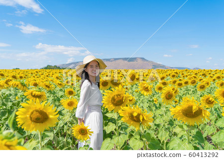 Portrait of happy Asian woman enjoying and 60413292